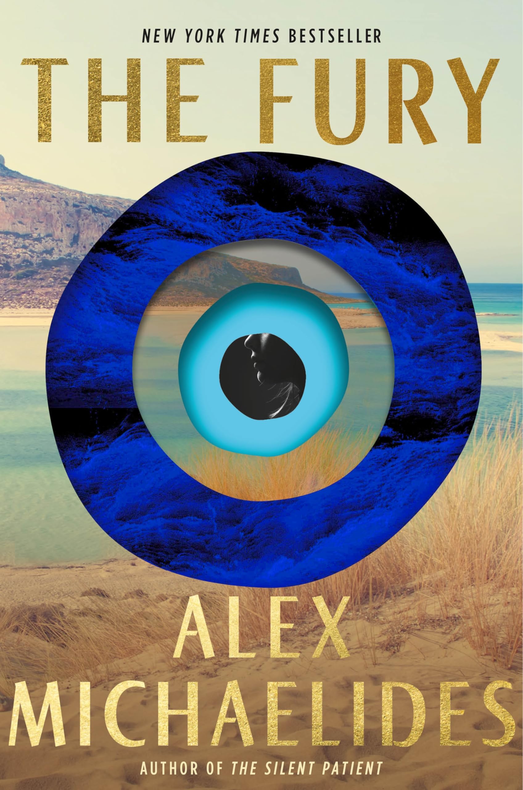 Cover of "The Fury" by Alex Michaelides features a large blue eye against a coastal landscape. The eye's center shows a silhouette of a face in profile.
