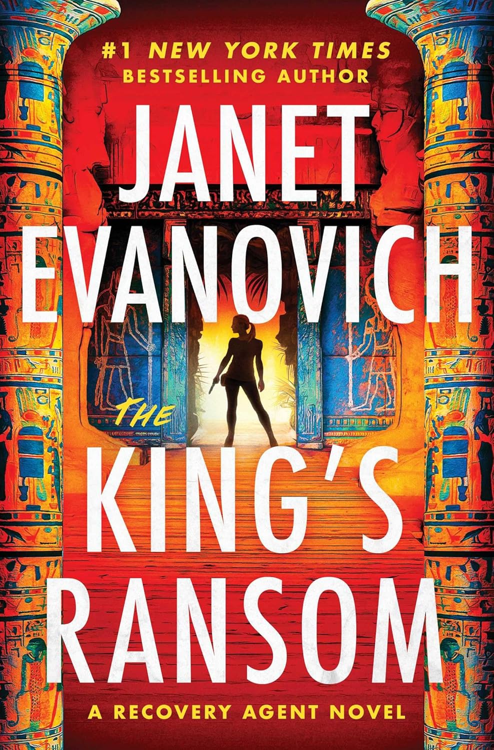 Silhouetted woman stands in a glowing temple doorway, flanked by ancient columns. Bold text reads “Janet Evanovich, The King’s Ransom.” Energetic and adventurous tone.